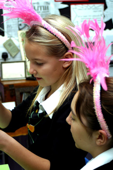 two school children dressed as superpinky in biodiversity workshop